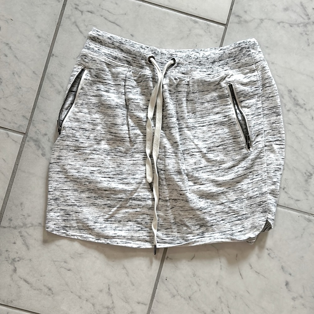Athletic skirt with built in shorts.